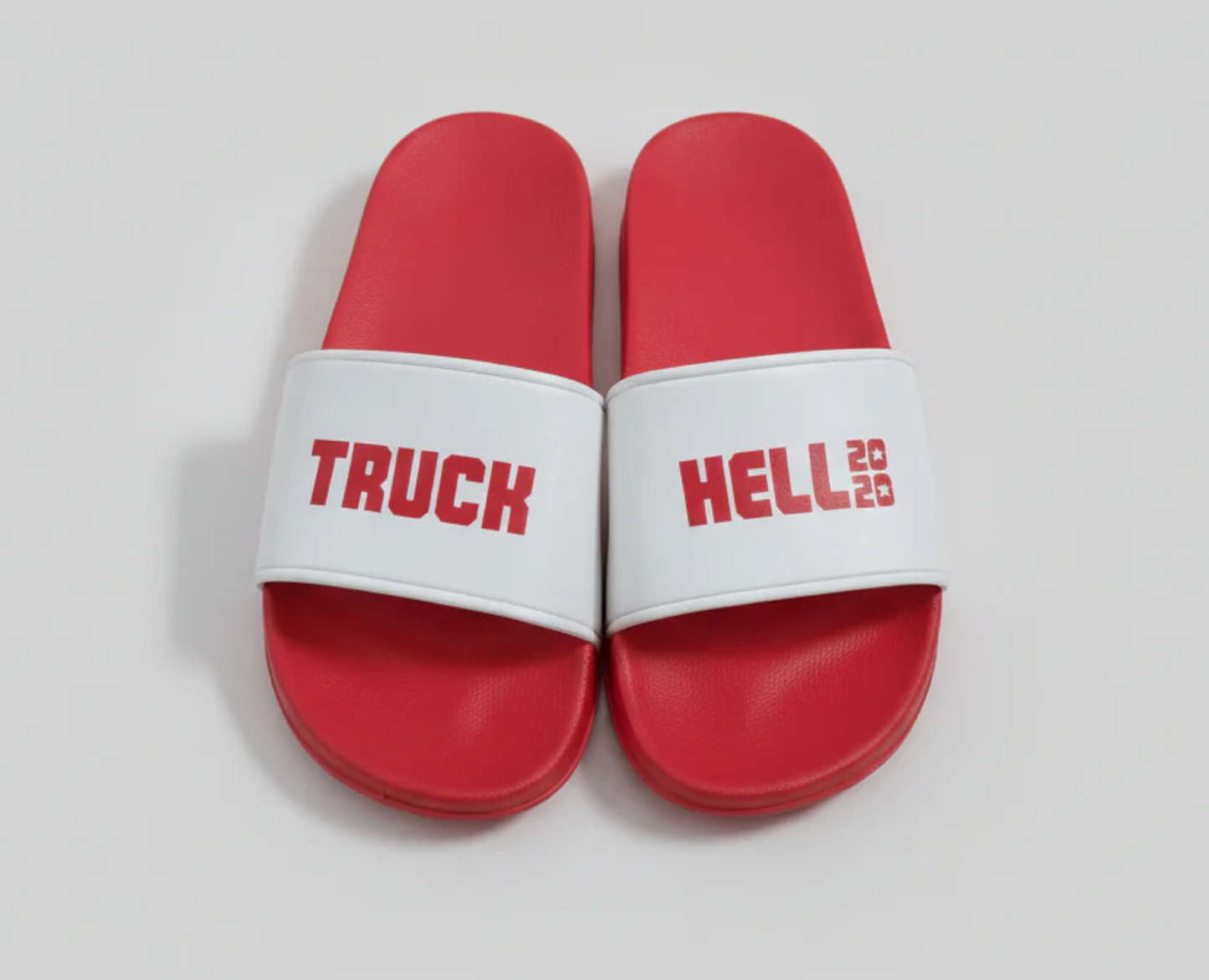 Red and white slides with TRUCK and HELL 2020 text, custom printed sandals