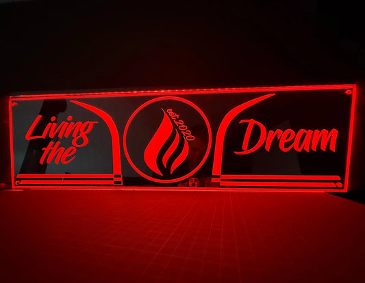 Red LED USB acrylic sign with 'Living the Dream' and flame graphic, ideal for vehicles.